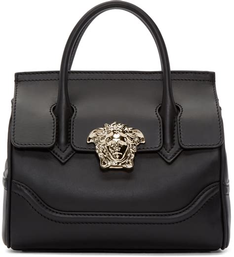 versace collection black leather wristlet clutch|Versace tote handbags.